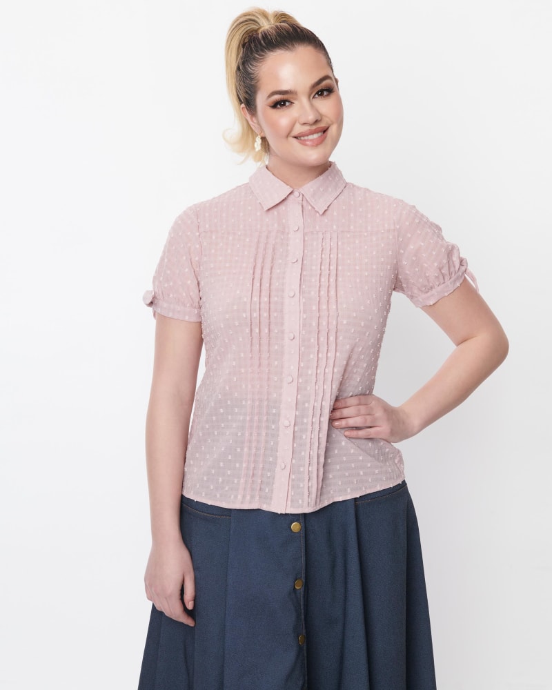 Front of a model wearing a size 2X Unique Vintage Rose Clip Dot Tie Cuff Blouse in Pink by Unique Vintage. | dia_product_style_image_id:301129